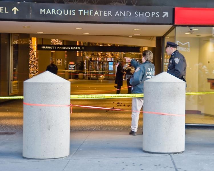 <a><img src="https://www.theepochtimes.com/assets/uploads/2015/09/crimescenecolor.JPG" alt="Outside a Marriott Hotel at Times Square where the shootout ended on Thursday.  (Aloysio Santos/The Epoch Times )" title="Outside a Marriott Hotel at Times Square where the shootout ended on Thursday.  (Aloysio Santos/The Epoch Times )" width="320" class="size-medium wp-image-1824768"/></a>