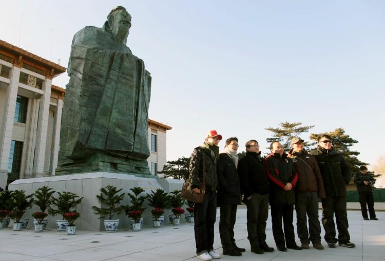 <a><img src="https://www.theepochtimes.com/assets/uploads/2015/09/cropConfucius.jpg" alt="NOW YOU SEE HIM: Chinese tourists pose in front of Confucius outside the National Museum at Tiananmen Square in January. The statue was removed without explanation four months later, highlighting the Communist Party's ambiguity in executing its new brand of Confucius propaganda. (STR/AFP/Getty Images)" title="NOW YOU SEE HIM: Chinese tourists pose in front of Confucius outside the National Museum at Tiananmen Square in January. The statue was removed without explanation four months later, highlighting the Communist Party's ambiguity in executing its new brand of Confucius propaganda. (STR/AFP/Getty Images)" width="575" class="size-medium wp-image-1800592"/></a>