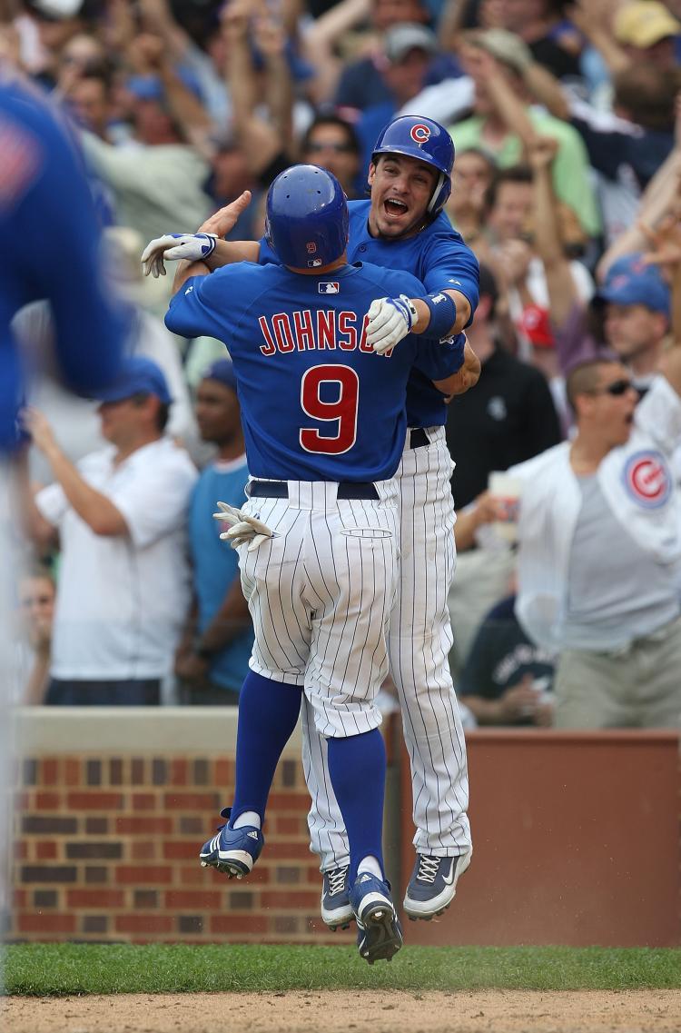 <a><img src="https://www.theepochtimes.com/assets/uploads/2015/09/cubs.jpg" alt="Ryan Theriot celebrates with Reed Johnson who scored the winning run. (Jonathan Daniel/Getty Images)" title="Ryan Theriot celebrates with Reed Johnson who scored the winning run. (Jonathan Daniel/Getty Images)" width="320" class="size-medium wp-image-1827834"/></a>