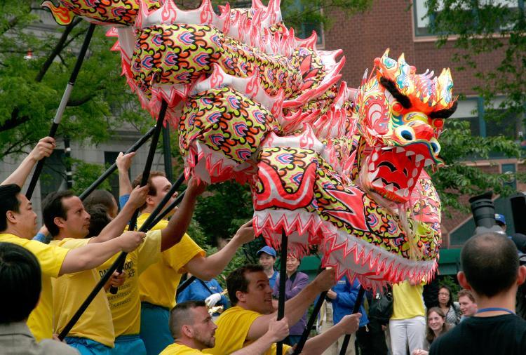 <a><img class="size-full wp-image-1793227" title="Dragon Dancers greet the crowds at Union Square Park. (Tim McDevitt/The Epoch Times)" src="https://www.theepochtimes.com/assets/uploads/2015/09/dragonteam.jpg" alt="" width="590"/></a>