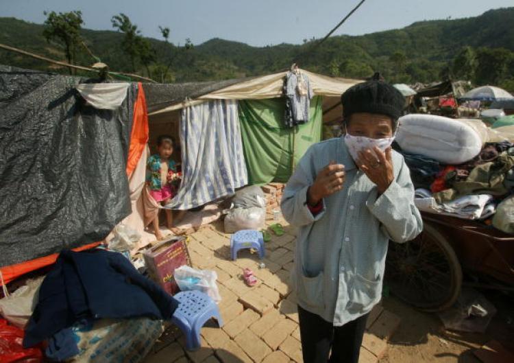 <a><img src="https://www.theepochtimes.com/assets/uploads/2015/09/earthquake_81165177.jpg" alt="Photo shows survivors of the May 12 earthquake in temporary shelters in Qingchuan County of Sichuan Province, China. Qingchuan County was hit Tuesday by a 6.1-magnitude quake. (Getty Images)" title="Photo shows survivors of the May 12 earthquake in temporary shelters in Qingchuan County of Sichuan Province, China. Qingchuan County was hit Tuesday by a 6.1-magnitude quake. (Getty Images)" width="320" class="size-medium wp-image-1834544"/></a>