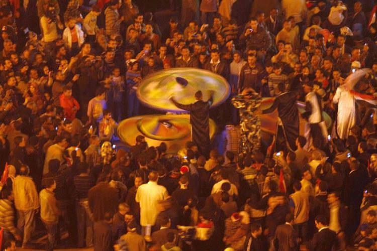 <a><img src="https://www.theepochtimes.com/assets/uploads/2015/09/egypt109179127.jpg" alt="Egyptians celebrate in Cairo's Tahrir Square, the epicentre of the popular revolt that drove veteran strongman Hosni Mubarak from power, on February 12, 2011. (Mohammed Abed/AFP/Getty Images)" title="Egyptians celebrate in Cairo's Tahrir Square, the epicentre of the popular revolt that drove veteran strongman Hosni Mubarak from power, on February 12, 2011. (Mohammed Abed/AFP/Getty Images)" width="320" class="size-medium wp-image-1807994"/></a>