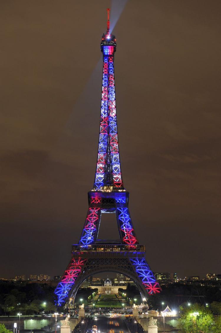 <a><img src="https://www.theepochtimes.com/assets/uploads/2015/09/eiffel92386014.jpg" alt="The illumination of the Eiffel Tower using more than 400 LED high tech projectors. (Bertrand Guay/AFP/Getty Images)" title="The illumination of the Eiffel Tower using more than 400 LED high tech projectors. (Bertrand Guay/AFP/Getty Images)" width="320" class="size-medium wp-image-1825252"/></a>