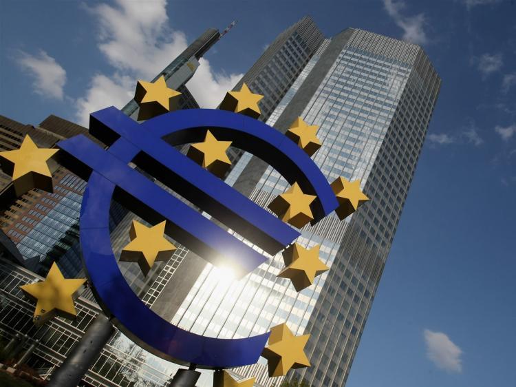 <a><img src="https://www.theepochtimes.com/assets/uploads/2015/09/euro-85890509-small.jpg" alt="A huge euro logo stands in front of the headquarters of the European Central Bank (ECB) on April 9, 2009 in Frankfurt am Main, Germany. (Ralph Orlowski/Getty Images)" title="A huge euro logo stands in front of the headquarters of the European Central Bank (ECB) on April 9, 2009 in Frankfurt am Main, Germany. (Ralph Orlowski/Getty Images)" width="320" class="size-medium wp-image-1826144"/></a>