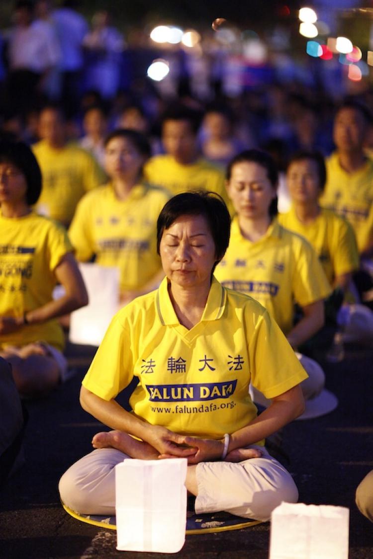 <a><img src="https://www.theepochtimes.com/assets/uploads/2015/09/falungong-1234.jpg" alt="PEACEFUL AND DETERMINED: Falun Gong practitioners from the New York area gathered outside the Chinese Consulate on Tuesday July 20th to mark the day the Chinese Communist Party began its 11 year persecution of the spiritual practice.  (Angela Wang/The Epoch Times)" title="PEACEFUL AND DETERMINED: Falun Gong practitioners from the New York area gathered outside the Chinese Consulate on Tuesday July 20th to mark the day the Chinese Communist Party began its 11 year persecution of the spiritual practice.  (Angela Wang/The Epoch Times)" width="320" class="size-medium wp-image-1817128"/></a>