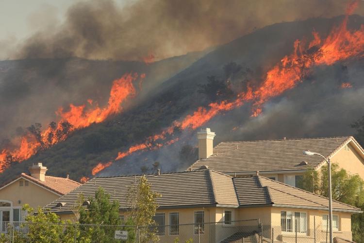 <a><img src="https://www.theepochtimes.com/assets/uploads/2015/09/fire.JPG" alt="WILD TIMES: The flames of the Porter Ranch fire rise near homes in the Villagio development on Monday in the Los Angeles area.  (David McNew/Getty Images)" title="WILD TIMES: The flames of the Porter Ranch fire rise near homes in the Villagio development on Monday in the Los Angeles area.  (David McNew/Getty Images)" width="320" class="size-medium wp-image-1833356"/></a>