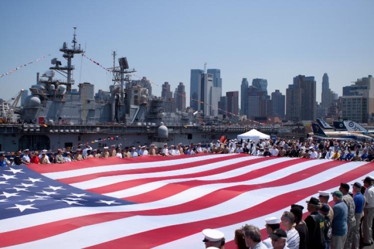<a><img src="https://www.theepochtimes.com/assets/uploads/2015/09/flag_web.JPG" alt="Members of the armed forces and others hold up a 100-foot U.S. flag at the Intrepid Sea, Air, and Space Museum on Memorial Day, May 31, 2010. (Henry Lam/The Epoch Times)" title="Members of the armed forces and others hold up a 100-foot U.S. flag at the Intrepid Sea, Air, and Space Museum on Memorial Day, May 31, 2010. (Henry Lam/The Epoch Times)" width="320" class="size-medium wp-image-1803446"/></a>