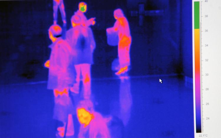 <a><img src="https://www.theepochtimes.com/assets/uploads/2015/09/flu86277608.jpg" alt="Travelers from an international flight are pictured on a thermographic device as they arrived at Sofia airport on April 29, 2009. (Dimitar Dilkoff/AFP/Getty Images)" title="Travelers from an international flight are pictured on a thermographic device as they arrived at Sofia airport on April 29, 2009. (Dimitar Dilkoff/AFP/Getty Images)" width="320" class="size-medium wp-image-1828062"/></a>