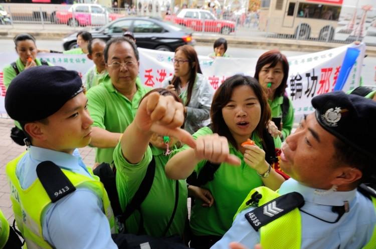 The attack campaign against Falun Gong in Hong Kong is reminiscent of attacks against groups targeted during China's Cultural Revolution. (The Epoch Times)