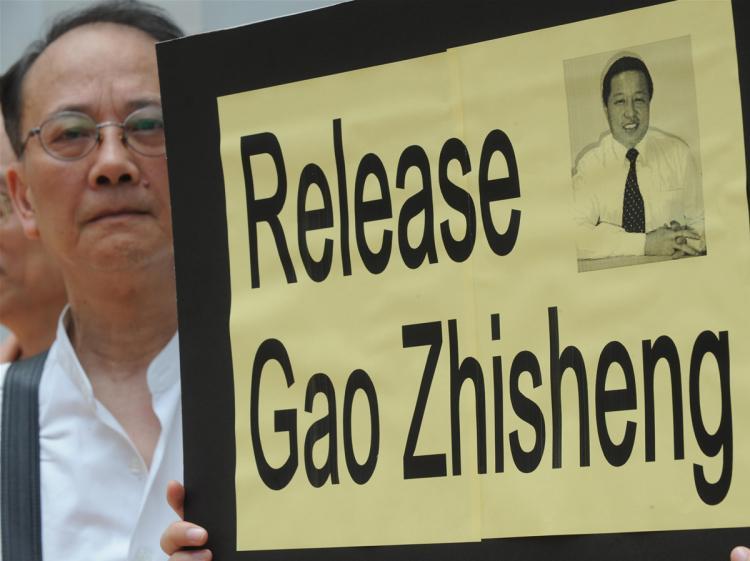 <a><img src="https://www.theepochtimes.com/assets/uploads/2015/09/gao-88526663.jpg" alt="A group of protestors including a lawyers concern group call for the release of human rights lawyer Gao Zhisheng (seen on poster) as they protest in Hong Kong on June 17, 2009. (Mike Clarke/AFP/Getty Images)" title="A group of protestors including a lawyers concern group call for the release of human rights lawyer Gao Zhisheng (seen on poster) as they protest in Hong Kong on June 17, 2009. (Mike Clarke/AFP/Getty Images)" width="320" class="size-medium wp-image-1823795"/></a>