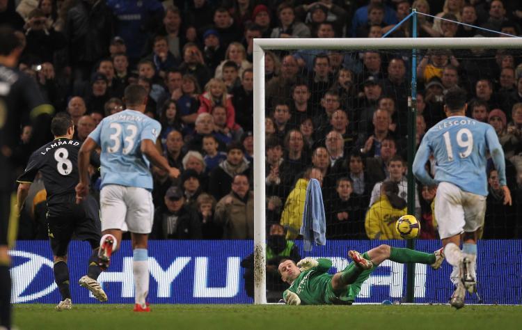 <a><img src="https://www.theepochtimes.com/assets/uploads/2015/09/given.jpg" alt="BIG SAVE: Chelsea's Frank Lampard #8 can't beat Manchester City's Shay Given from the penalty spot." title="BIG SAVE: Chelsea's Frank Lampard #8 can't beat Manchester City's Shay Given from the penalty spot." width="320" class="size-medium wp-image-1824869"/></a>