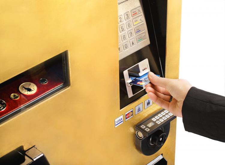 <a><img src="https://www.theepochtimes.com/assets/uploads/2015/09/gold-to-go_atm-4_300dpi.jpg" alt="A Gold to go ATM which dispenses gold coins and bars. (Courtesy of Gold to go.)" title="A Gold to go ATM which dispenses gold coins and bars. (Courtesy of Gold to go.)" width="320" class="size-medium wp-image-1810788"/></a>