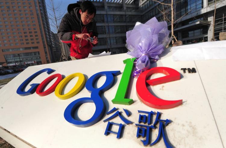 <a><img src="https://www.theepochtimes.com/assets/uploads/2015/09/goog95761777.jpg" alt="A bouquet of flowers lay upon the company logo as a man photographs a commentary placed beneath a rock outside the Google China headquarters in Beijing on January 14, 2010. (Frederic J. Brown/AFP/Getty Images)" title="A bouquet of flowers lay upon the company logo as a man photographs a commentary placed beneath a rock outside the Google China headquarters in Beijing on January 14, 2010. (Frederic J. Brown/AFP/Getty Images)" width="320" class="size-medium wp-image-1823849"/></a>