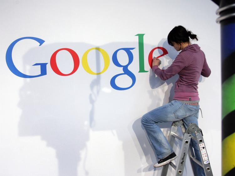 <a><img src="https://www.theepochtimes.com/assets/uploads/2015/09/google-97200884.jpg" alt="A stand builder fixes a logo at the Google stand at the CeBit 2010 exhibition, the world's biggest high-tech fair in Hanover, northern Germany on March 1, 2010. (Ronny Hartmann/AFP/Getty Images)" title="A stand builder fixes a logo at the Google stand at the CeBit 2010 exhibition, the world's biggest high-tech fair in Hanover, northern Germany on March 1, 2010. (Ronny Hartmann/AFP/Getty Images)" width="320" class="size-medium wp-image-1818973"/></a>
