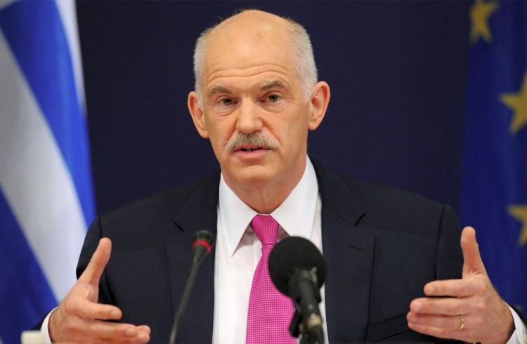 <a><img src="https://www.theepochtimes.com/assets/uploads/2015/09/greece98062307.jpg" alt="Greek Prime Minister George A. Papandreou speaks during a press conference at the European Union summit at the European Council headquarters on March 26 in Brussels. (John Thys/AFP/Getty Images )" title="Greek Prime Minister George A. Papandreou speaks during a press conference at the European Union summit at the European Council headquarters on March 26 in Brussels. (John Thys/AFP/Getty Images )" width="320" class="size-medium wp-image-1821202"/></a>