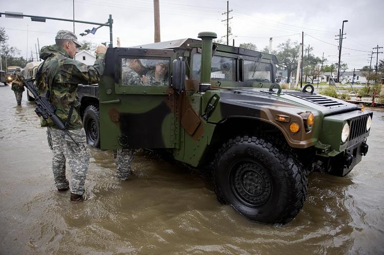 <a><img src="https://www.theepochtimes.com/assets/uploads/2015/09/guard82620415.jpg" alt="National Guard troops patrol a flooded neighborhood near the Industrial Canal in New Orleans, Louisiana, September 1, 2008 during Hurricane Gustav. (Jim Watson/AFP/Getty Images)" title="National Guard troops patrol a flooded neighborhood near the Industrial Canal in New Orleans, Louisiana, September 1, 2008 during Hurricane Gustav. (Jim Watson/AFP/Getty Images)" width="320" class="size-medium wp-image-1833828"/></a>