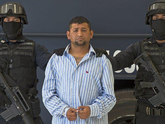 <a><img class="size-full wp-image-1782429" title="Mexican Federal police personnel escort  David Rosales Guzman, aka "Commander Devil",  alleged member of the Gulf cartel,  during his presentation to the press at the Police Command Centre in Mexico City on September 02, 2012. According to the Mexican authorities , Rosales Guzman  was in charge of the illegal drug trafficking In Monterrey, north Me" src="https://www.theepochtimes.com/assets/uploads/2015/09/guzman151150014.jpg" alt="Mexican Federal police personnel escort  David Rosales Guzman, aka "Commander Devil",  alleged member of the Gulf cartel,  during his presentation to the press at the Police Command Centre in Mexico City on September 02, 2012. According to the Mexican authorities , Rosales Guzman  was in charge of the illegal drug trafficking In Monterrey, north Me" width="568" height="426"/></a>