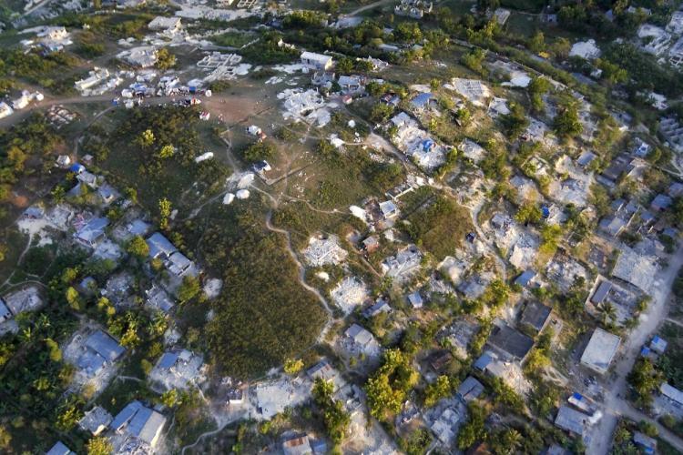 <a><img src="https://www.theepochtimes.com/assets/uploads/2015/09/hai95928516.jpg" alt="An arial view of a destroyed hillside village 30 kilometers outside the capital on January 21, 2010 near Gressier, Haiti. Haiti is trying to recover from a powerful 7.0-strong earthquake that struck on January 12 and devastated the country. (Logan Abassi/MINUSTAH via Getty Images)" title="An arial view of a destroyed hillside village 30 kilometers outside the capital on January 21, 2010 near Gressier, Haiti. Haiti is trying to recover from a powerful 7.0-strong earthquake that struck on January 12 and devastated the country. (Logan Abassi/MINUSTAH via Getty Images)" width="320" class="size-medium wp-image-1823769"/></a>