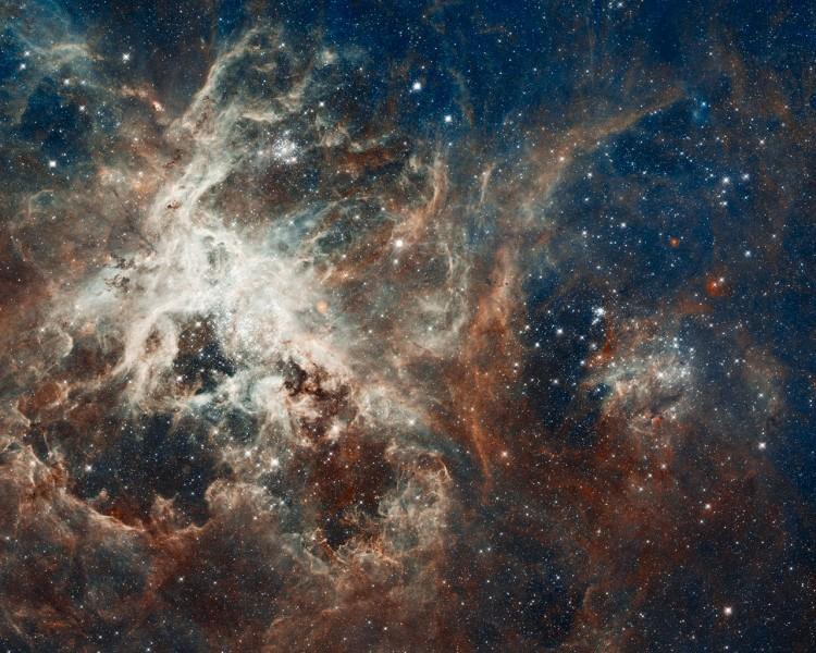 <a><img class="size-full wp-image-1788989" title="30 Doradus is the brightest star-forming region in our galactic neighbourhood and home to the most massive stars ever seen. (NASA, ESA, ESO, D. Lennon and E. Sabbi (ESA/STScI), J. Anderson, S. E. de Mink, R. van der Marel, T. Sohn, and N. Walborn (STScI), N. Bastian (Excellence Cluster, Munich), L. Bedin (INAF, Padua), E. Bressert (ESO), P. Crowther (Sheffield), A. de Koter (Amsterdam), C. Evans (UKATC/STFC, Edinburgh), A. Herrero (IAC, Tenerife), N. Langer (AifA, Bonn), I. Platais (JHU) and H. Sana (Amsterdam))" src="https://www.theepochtimes.com/assets/uploads/2015/09/heic1206a.jpg" alt="30 Doradus is the brightest star-forming region in our galactic neighbourhood and home to the most massive stars ever seen. (NASA, ESA, ESO, D. Lennon and E. Sabbi (ESA/STScI), J. Anderson, S. E. de Mink, R. van der Marel, T. Sohn, and N. Walborn (STScI), N. Bastian (Excellence Cluster, Munich), L. Bedin (INAF, Padua), E. Bressert (ESO), P. Crowther (Sheffield), A. de Koter (Amsterdam), C. Evans (UKATC/STFC, Edinburgh), A. Herrero (IAC, Tenerife), N. Langer (AifA, Bonn), I. Platais (JHU) and H. Sana (Amsterdam))" width="750" height="600"/></a>