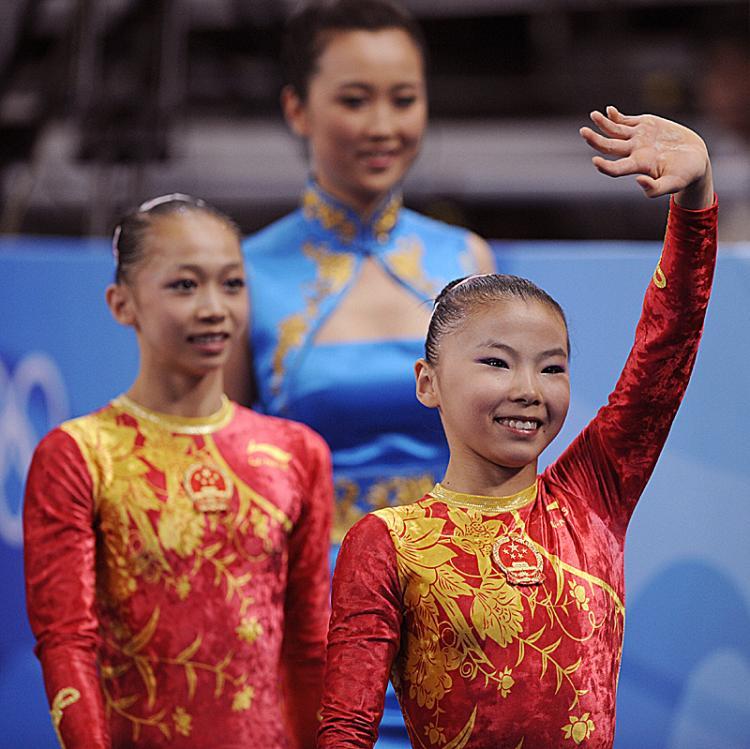 <a><img src="https://www.theepochtimes.com/assets/uploads/2015/09/hejeyang82401161.jpg" alt="China's He Kexin (R)and Yang Yilin (L) might lose their Olympic medals for being underage.  (Franck Fife/AFP/Getty Images)" title="China's He Kexin (R)and Yang Yilin (L) might lose their Olympic medals for being underage.  (Franck Fife/AFP/Getty Images)" width="320" class="size-medium wp-image-1834016"/></a>
