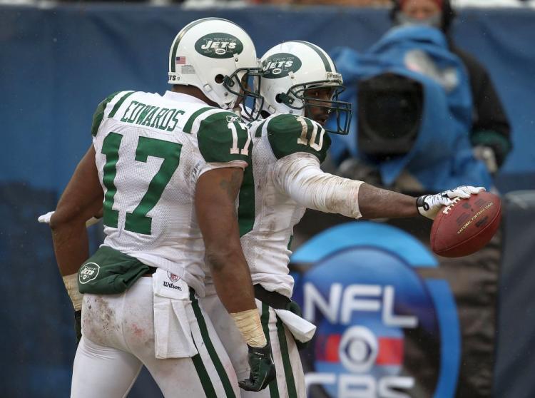 <a><img src="https://www.theepochtimes.com/assets/uploads/2015/09/holmes107783997.jpg" alt="Santonio Holmes' touchdown (right) helped give the Jets a fighting chance against the Chicago Bears on Sunday, but it wasn't enough. (Jonathan Daniel/Getty Images)" title="Santonio Holmes' touchdown (right) helped give the Jets a fighting chance against the Chicago Bears on Sunday, but it wasn't enough. (Jonathan Daniel/Getty Images)" width="320" class="size-medium wp-image-1810503"/></a>