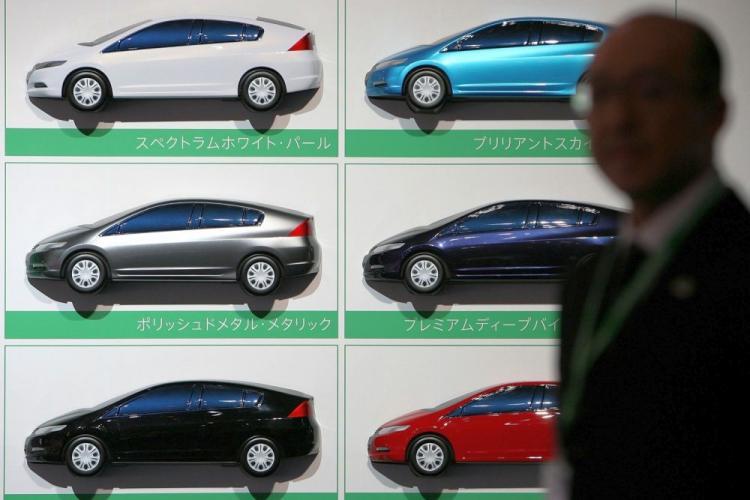 <a><img src="https://www.theepochtimes.com/assets/uploads/2015/09/honda84653305.jpg" alt="Sketches of the Honda Insight hybrid is seen at its launch event in Japan last year. Japanese automakers have increased February production in anticipation of higher sales in 2010. (Kiyoshi Ota/Getty Images )" title="Sketches of the Honda Insight hybrid is seen at its launch event in Japan last year. Japanese automakers have increased February production in anticipation of higher sales in 2010. (Kiyoshi Ota/Getty Images )" width="320" class="size-medium wp-image-1821613"/></a>