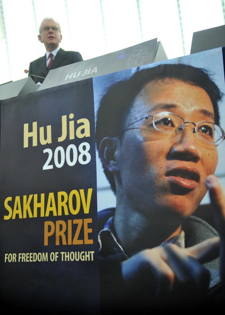 <a><img src="https://www.theepochtimes.com/assets/uploads/2015/09/hujia.jpg" alt="European Parliament (EP) President Hans-Gert Pottering gave a speech beside Hu Jia´s empty chair December 17 during the 2008 Sakharov prize-giving ceremony at the European Parliament in Strasbourg. (Dominique Faget/ AFP)" title="European Parliament (EP) President Hans-Gert Pottering gave a speech beside Hu Jia´s empty chair December 17 during the 2008 Sakharov prize-giving ceremony at the European Parliament in Strasbourg. (Dominique Faget/ AFP)" width="320" class="size-medium wp-image-1832047"/></a>