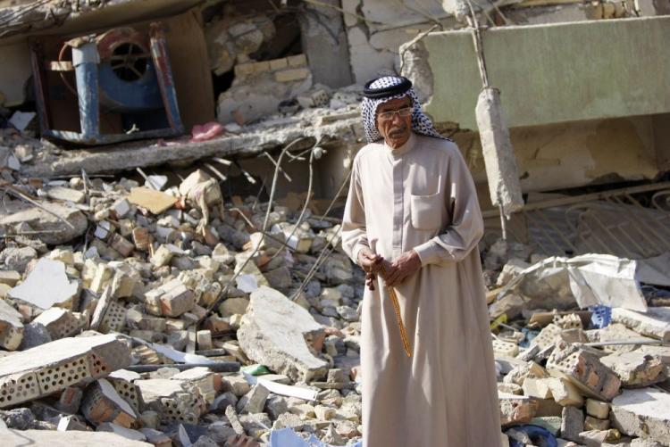<a><img src="https://www.theepochtimes.com/assets/uploads/2015/09/i97507832iraqelection.jpg" alt="An Iraqi man inspects destruction at the site of an explosion in Baghdad on March 7. Iraqis defied waves of bomb, mortar, and rocket attacks that killed 38 people, to turn out to vote in huge numbers in the second parliamentary elections since the overthrow of Saddam Hussein in 2003. (Ahmad Al-Rubaye/AFP/Getty Images )" title="An Iraqi man inspects destruction at the site of an explosion in Baghdad on March 7. Iraqis defied waves of bomb, mortar, and rocket attacks that killed 38 people, to turn out to vote in huge numbers in the second parliamentary elections since the overthrow of Saddam Hussein in 2003. (Ahmad Al-Rubaye/AFP/Getty Images )" width="320" class="size-medium wp-image-1822350"/></a>