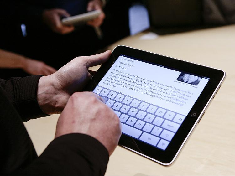 <a><img src="https://www.theepochtimes.com/assets/uploads/2015/09/iPad.jpg" alt="Event guests play with the new Apple iPad during an Apple event on Jan. 27, 2010, in San Francisco. Apple has lost a patent case it placed on the 'i' letter being used in products. (Ryan Anson/AFP/Getty Images)" title="Event guests play with the new Apple iPad during an Apple event on Jan. 27, 2010, in San Francisco. Apple has lost a patent case it placed on the 'i' letter being used in products. (Ryan Anson/AFP/Getty Images)" width="320" class="size-medium wp-image-1822160"/></a>