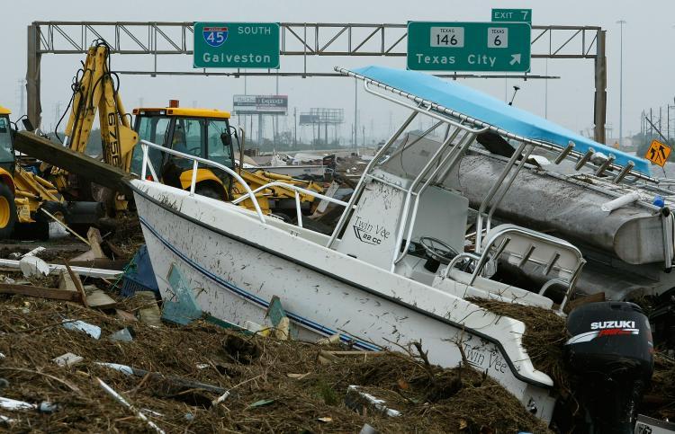 <a><img src="https://www.theepochtimes.com/assets/uploads/2015/09/ike82804812.jpg" alt="IKE AFTERMATH: Heavy equipment starts to move boats and other debris off of Rt.45 left by Hurricane Ike September 13, 2008 in Galveston, Texas. Hurricane Ike made landfall in the middle of the night causing wide spread damage to the Texas coast.  (Mark Wilson/Getty Images )" title="IKE AFTERMATH: Heavy equipment starts to move boats and other debris off of Rt.45 left by Hurricane Ike September 13, 2008 in Galveston, Texas. Hurricane Ike made landfall in the middle of the night causing wide spread damage to the Texas coast.  (Mark Wilson/Getty Images )" width="320" class="size-medium wp-image-1833726"/></a>