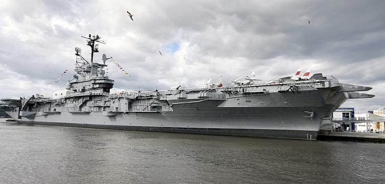 <a><img src="https://www.theepochtimes.com/assets/uploads/2015/09/intrepidcolor.jpg" alt="HOMECOMING: The Intrepid Aircraft Carrier, a WWII workhorse, returned to its Hudson River Dock on Thursday after a two year renovation. " title="HOMECOMING: The Intrepid Aircraft Carrier, a WWII workhorse, returned to its Hudson River Dock on Thursday after a two year renovation. " width="320" class="size-medium wp-image-1833512"/></a>