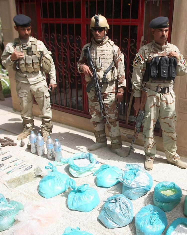 <a><img src="https://www.theepochtimes.com/assets/uploads/2015/09/ir98239945-IRAQ.jpg" alt="Iraqi soldiers display a cache of weapons and bomb-making equipment discovered inside a building in the Al-Jamia district of west Baghdad on April 4. Three car bombs struck the center of Baghdad Sunday, killing 41 and wounding over 200 people.  (Ahmad Al-Rubaye/AFP/Getty Images )" title="Iraqi soldiers display a cache of weapons and bomb-making equipment discovered inside a building in the Al-Jamia district of west Baghdad on April 4. Three car bombs struck the center of Baghdad Sunday, killing 41 and wounding over 200 people.  (Ahmad Al-Rubaye/AFP/Getty Images )" width="320" class="size-medium wp-image-1821452"/></a>