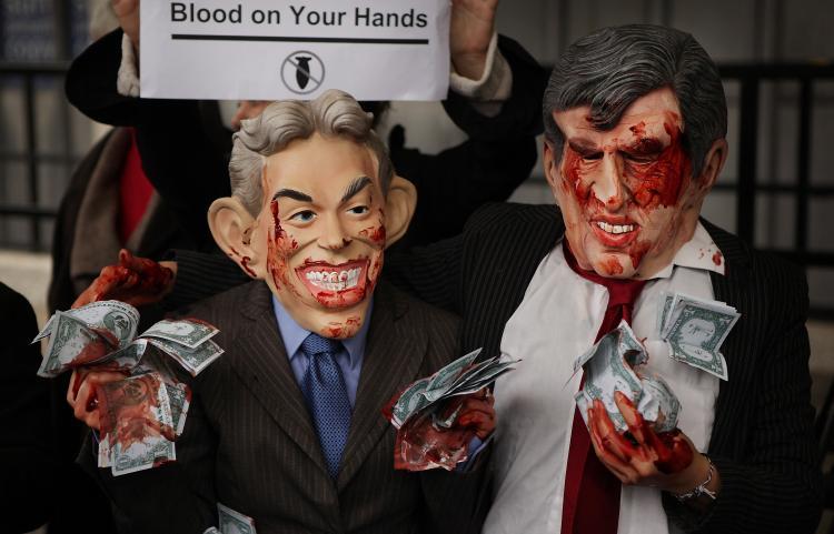 <a><img src="https://www.theepochtimes.com/assets/uploads/2015/09/iraq-93347444.jpg" alt="Anti-war demonstrators dressed up as bloodied former Prime Minister Tony Blair (L) and Prime Minister Gordon Brown stand outside the Iraq Inquiry on November 24, 2009 in London. (Peter Macdiarmid/Getty Images)" title="Anti-war demonstrators dressed up as bloodied former Prime Minister Tony Blair (L) and Prime Minister Gordon Brown stand outside the Iraq Inquiry on November 24, 2009 in London. (Peter Macdiarmid/Getty Images)" width="320" class="size-medium wp-image-1825076"/></a>