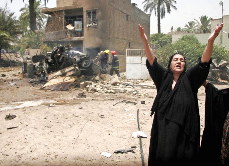 <a><img src="https://www.theepochtimes.com/assets/uploads/2015/09/iraq102319946-WEB.jpg" alt="A woman shouts in despair after a car bomb killed mainly women and traffic police: an Iraqi Body Count report shows civilian deaths in Iraq in 2010 are the lowest since the U.S. invasion in 2003, but as most U.S. troops left the country this summer, violence continues killing over 10 civilians a day. (Khalil Al-Murshidi/AFP/Getty Images )" title="A woman shouts in despair after a car bomb killed mainly women and traffic police: an Iraqi Body Count report shows civilian deaths in Iraq in 2010 are the lowest since the U.S. invasion in 2003, but as most U.S. troops left the country this summer, violence continues killing over 10 civilians a day. (Khalil Al-Murshidi/AFP/Getty Images )" width="320" class="size-medium wp-image-1810283"/></a>