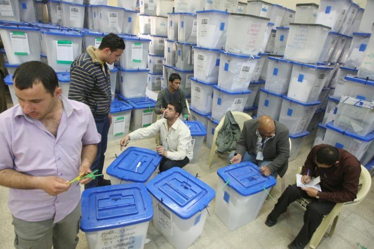 <a><img src="https://www.theepochtimes.com/assets/uploads/2015/09/iraq97537014.jpg" alt="Iraqi workers at the Independent High Electoral Commission (IHEC) headquarters in Baghdad seal and store ballot boxes on Monday. (Ahmad Al-Rubaye/AFP/Getty Images)" title="Iraqi workers at the Independent High Electoral Commission (IHEC) headquarters in Baghdad seal and store ballot boxes on Monday. (Ahmad Al-Rubaye/AFP/Getty Images)" width="320" class="size-medium wp-image-1822304"/></a>