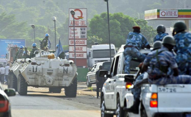 <a><img src="https://www.theepochtimes.com/assets/uploads/2015/09/ivory_coast_107789066_WEB.jpg" alt="Ivory Coast violence: Bangladeshi U.N. peacekeepers patrolling the Abobo neighborhood are followed by Ivory Coast's national police (R) in Abidjan on Dec. 27. Ivory Coast strongman Laurent Gbagbo saw off another challenge to his rule as a call for a general strike fell flat, and he prepared to facedown an ultimatum from West African leaders. (ISSOUF SANOGO/AFP/Getty Images)" title="Ivory Coast violence: Bangladeshi U.N. peacekeepers patrolling the Abobo neighborhood are followed by Ivory Coast's national police (R) in Abidjan on Dec. 27. Ivory Coast strongman Laurent Gbagbo saw off another challenge to his rule as a call for a general strike fell flat, and he prepared to facedown an ultimatum from West African leaders. (ISSOUF SANOGO/AFP/Getty Images)" width="320" class="size-medium wp-image-1810434"/></a>