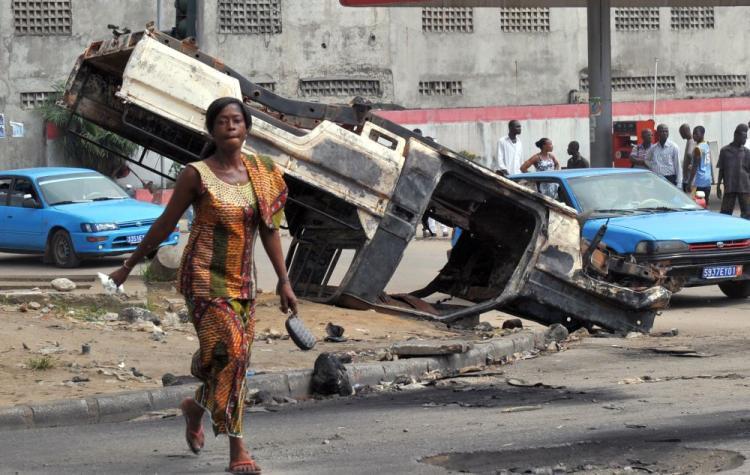 <a><img src="https://www.theepochtimes.com/assets/uploads/2015/09/ivorycoast107818599-Print.jpg" alt="A woman crosses the street in front of a burnt-out United Nations peacekeeper car on Thursday in the Yopougon neighbourhood of Abidjan, home to supporters of Laurent Gbagbo. A mob attacked a UN convoy in Abidjan on December 28, 2010, injuring one peacekeeper with a machete and setting a vehicle alight, the UN said. (Issouf Sanogo/AFP/Getty Images)" title="A woman crosses the street in front of a burnt-out United Nations peacekeeper car on Thursday in the Yopougon neighbourhood of Abidjan, home to supporters of Laurent Gbagbo. A mob attacked a UN convoy in Abidjan on December 28, 2010, injuring one peacekeeper with a machete and setting a vehicle alight, the UN said. (Issouf Sanogo/AFP/Getty Images)" width="320" class="size-medium wp-image-1810285"/></a>