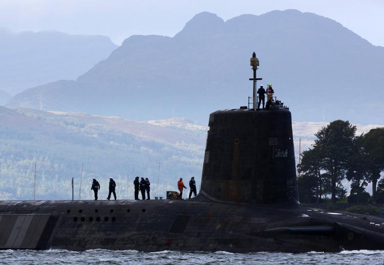 <a><img src="https://www.theepochtimes.com/assets/uploads/2015/09/j91062950.jpg" alt="A Trident submarine makes it's way out from Faslane Naval base on September 23, 2009, in Faslane, Scotland. The new British prime minister will need to consider cutting the Trident missile-carrying submarines. (Jeff J Mitchell/Getty Images )" title="A Trident submarine makes it's way out from Faslane Naval base on September 23, 2009, in Faslane, Scotland. The new British prime minister will need to consider cutting the Trident missile-carrying submarines. (Jeff J Mitchell/Getty Images )" width="320" class="size-medium wp-image-1820218"/></a>