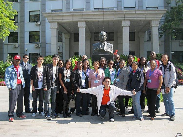 Journalists and editors from the Caribbean smile for the camera as a young chaperone 'Eric' gives the thumbs-up. At the Foreign Affairs University the journalists would be taught that China's political system had changed a lot, and even that China was not a one-party state. (Courtesy of Gwyneth Harold)
