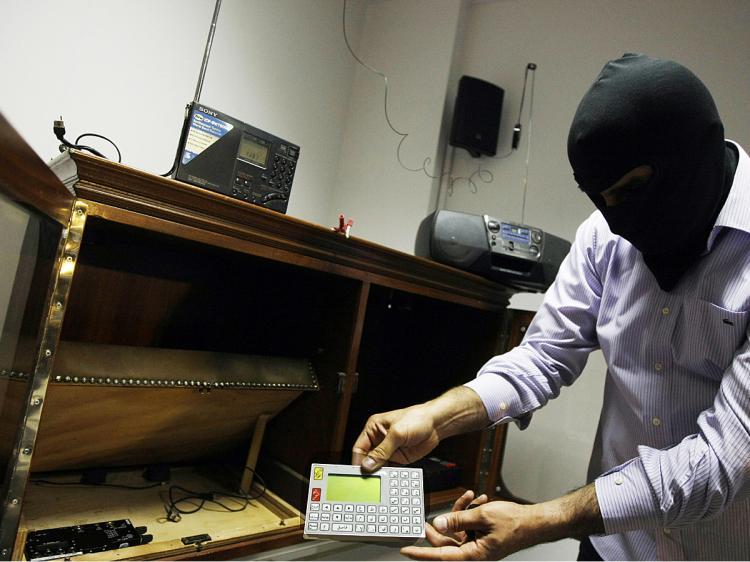 <a><img src="https://www.theepochtimes.com/assets/uploads/2015/09/leebo86963718.jpg" alt="A masked Lebanese secret service officer shows to the media at the Lebanese security services headquarters in Beirut electronic devices found with arrested Lebanese nationals accused of spying for Israel. (Joseph Barrak/AFP/Getty Images)" title="A masked Lebanese secret service officer shows to the media at the Lebanese security services headquarters in Beirut electronic devices found with arrested Lebanese nationals accused of spying for Israel. (Joseph Barrak/AFP/Getty Images)" width="320" class="size-medium wp-image-1828255"/></a>