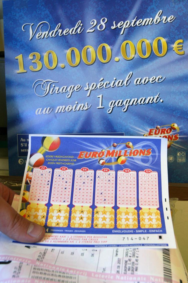 <a><img src="https://www.theepochtimes.com/assets/uploads/2015/09/lott77076584.jpg" alt="A man holds a Euromillions lottery ticket at a store in Brussels in this file photo from Sept. 28, 2007. Euromillions is a joint venture between Austria, Belgium, Britain, France, Ireland, Luxembourg, Portugal, Spain, and Switzerland. (Nina Francesca/AFP/Getty Images)" title="A man holds a Euromillions lottery ticket at a store in Brussels in this file photo from Sept. 28, 2007. Euromillions is a joint venture between Austria, Belgium, Britain, France, Ireland, Luxembourg, Portugal, Spain, and Switzerland. (Nina Francesca/AFP/Getty Images)" width="320" class="size-medium wp-image-1832116"/></a>