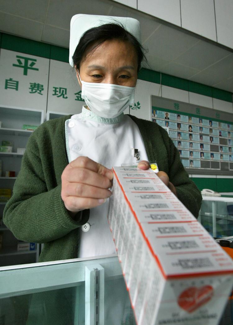 <a><img src="https://www.theepochtimes.com/assets/uploads/2015/09/medicine3473098.jpg" alt="A hospital worker at a dispensary stocks up on medicine for general health in Beijing. Chinese counterfeit medicines have likely caused hundreds if not thousands of deaths outside of China in recent years. (Frederic J. Brown/AFP/Getty Images)" title="A hospital worker at a dispensary stocks up on medicine for general health in Beijing. Chinese counterfeit medicines have likely caused hundreds if not thousands of deaths outside of China in recent years. (Frederic J. Brown/AFP/Getty Images)" width="320" class="size-medium wp-image-1833576"/></a>