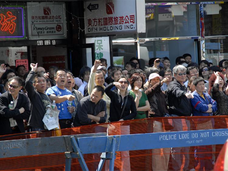 <a><img class="size-medium wp-image-1832979" title="An angry mob heckles organizers at the Quit the CCP Center in Flushings, New York. (Th Epoch Times)" src="https://www.theepochtimes.com/assets/uploads/2015/09/mobscene.jpg" alt="An angry mob heckles organizers at the Quit the CCP Center in Flushings, New York. (Th Epoch Times)" width="320"/></a>