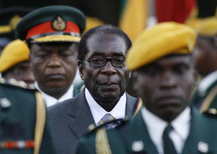 <a><img src="https://www.theepochtimes.com/assets/uploads/2015/09/mugabe.jpg" alt="Zimbabwean President Robert Mugabe walks with a guard to be sworn in for a sixth term in office in Harare, on June 29, 2008 after being declared the winner of a one-man election. (Alexander Joe/AFP/Getty Images)" title="Zimbabwean President Robert Mugabe walks with a guard to be sworn in for a sixth term in office in Harare, on June 29, 2008 after being declared the winner of a one-man election. (Alexander Joe/AFP/Getty Images)" width="320" class="size-medium wp-image-1835105"/></a>
