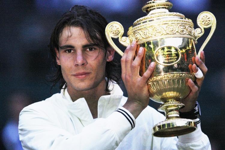 <a><img src="https://www.theepochtimes.com/assets/uploads/2015/09/nadal.jpg" alt="Spains Rafael Nadal poses with his trophy after defeating Switzerlands Roger Federer during the final match of the 2008 Wimbledon championships on Sunday.  (Adrian Dennis/AFP/Getty Images)" title="Spains Rafael Nadal poses with his trophy after defeating Switzerlands Roger Federer during the final match of the 2008 Wimbledon championships on Sunday.  (Adrian Dennis/AFP/Getty Images)" width="320" class="size-medium wp-image-1835088"/></a>