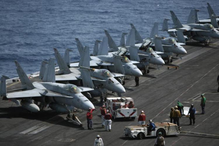 <a><img src="https://www.theepochtimes.com/assets/uploads/2015/09/navy_advancement_100961463.jpg" alt="US Navy Advancement Test Results Arrive Today. In this image, US Navy crewmen gather around a line of F-18 jet fighters on the deck of the USS Eisenhower aircraft carrier in the Arabian sea on May 24. (Marwan Naamani/AFP/Getty Images)" title="US Navy Advancement Test Results Arrive Today. In this image, US Navy crewmen gather around a line of F-18 jet fighters on the deck of the USS Eisenhower aircraft carrier in the Arabian sea on May 24. (Marwan Naamani/AFP/Getty Images)" width="320" class="size-medium wp-image-1819385"/></a>