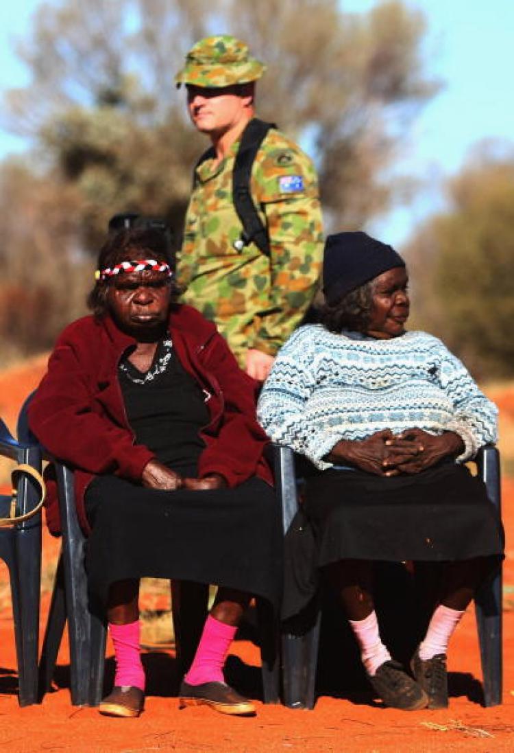 <a><img src="https://www.theepochtimes.com/assets/uploads/2015/09/nter_75093038.jpg" alt="A member of the Australian Army walks by as Aboriginal women gather for a meeting on July 6, 2007 at Mutitjulu, near Alice Springs. The Federal Government has restated its support for the Northern Territory intervention  in Indigenous communities. (Ian Walie/Getty Images)" title="A member of the Australian Army walks by as Aboriginal women gather for a meeting on July 6, 2007 at Mutitjulu, near Alice Springs. The Federal Government has restated its support for the Northern Territory intervention  in Indigenous communities. (Ian Walie/Getty Images)" width="320" class="size-medium wp-image-1833190"/></a>