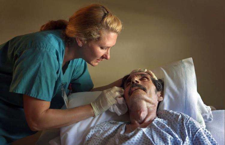 <a><img src="https://www.theepochtimes.com/assets/uploads/2015/09/nurse89980238.jpg" alt="Registered Nurse N. Von Reiter comforts Ramond Garcia as his health quickly declines at the Hospice of Saint John on August 20, 2009 in Lakewood, Colorado. Nursing becoming one of the fastest growing professions in the US. (John Moore/Getty Images)" title="Registered Nurse N. Von Reiter comforts Ramond Garcia as his health quickly declines at the Hospice of Saint John on August 20, 2009 in Lakewood, Colorado. Nursing becoming one of the fastest growing professions in the US. (John Moore/Getty Images)" width="320" class="size-medium wp-image-1819915"/></a>