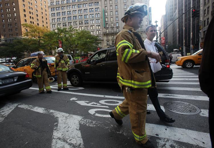 <a><img src="https://www.theepochtimes.com/assets/uploads/2015/09/ny_path_92145659.jpg" alt="Firefighters walk near the scenes of a PATH commuter train accident Oct. 21, 2009 in New York City. The incident resulted in a few minor injuries. (Mario Tama/Getty Images)" title="Firefighters walk near the scenes of a PATH commuter train accident Oct. 21, 2009 in New York City. The incident resulted in a few minor injuries. (Mario Tama/Getty Images)" width="320" class="size-medium wp-image-1825660"/></a>