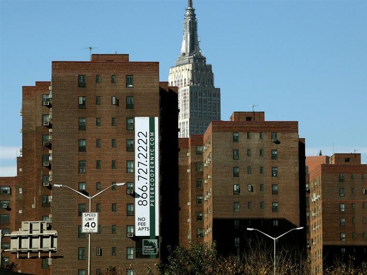 <a><img src="https://www.theepochtimes.com/assets/uploads/2015/09/nyc-92234666.jpg" alt="The Stuyvesant Town and Peter Cooper Village apartment complexes are seen in front of the Empire State Building October 22, 2009 in New York City. (Mario Tama/Getty Images)" title="The Stuyvesant Town and Peter Cooper Village apartment complexes are seen in front of the Empire State Building October 22, 2009 in New York City. (Mario Tama/Getty Images)" width="320" class="size-medium wp-image-1825514"/></a>